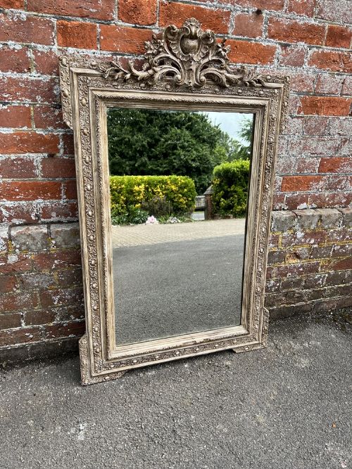 A Delightful Antique French 19th Century Carved Wood and Gesso Painted Crested Mirror.