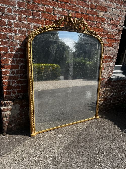 An Exceptional Large Antique English 19th Century Arched Top Gilt Overmantle Mirror.