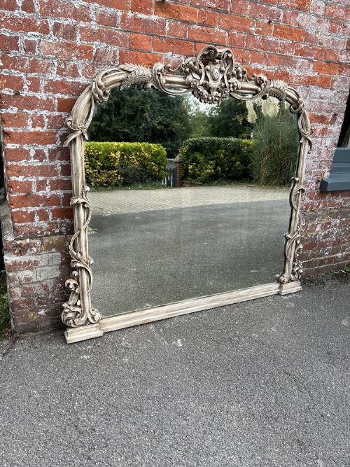 A Highly Impressive Large Antique English 19th Century Carved Wood Arched Painted Overmantle Mirror.