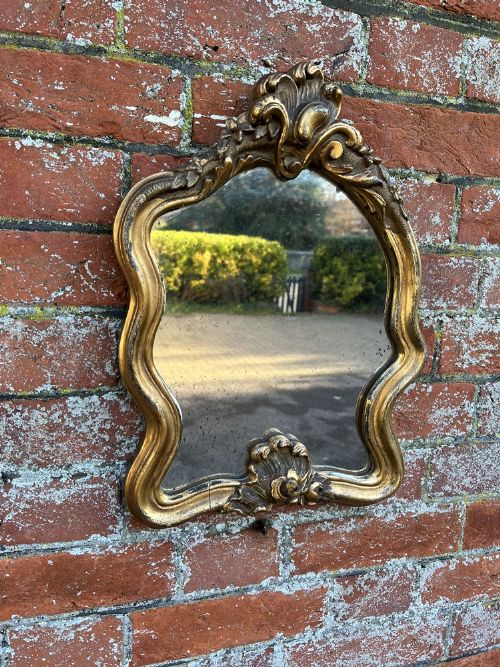 A Delightful Useful Size Antique French 19th Century Carved Wood Original Gilt Shaped Mirror.