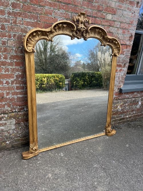 A STUNNING LARGE ANTIQUE ENGLISH 19TH CENTURY CARVED WOOD GILT SHAPED TOP OVERMANTLE MIRROR