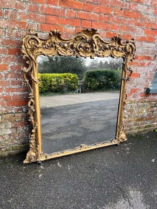 A Spectacular Large Antique English 19th Century  Gilt Overmantle Mirror.