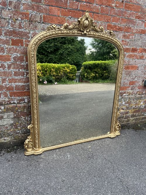 An Exceptional Large Antique English 19th Century Carved Wood & Gesso Arched Top Gilt Overmantle Mirror.