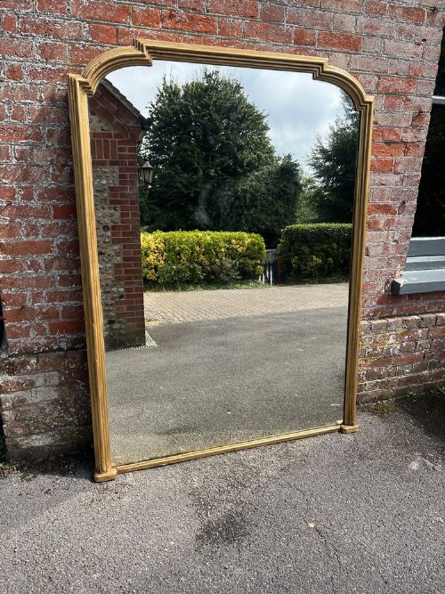 A Spectacular Large Antique English 19th C Shaped Top Gilt Mirror.