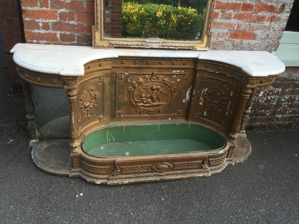 An Absolutely stunning highly decorative Antique 19th Century French carved wood original distressed gilt Console table.