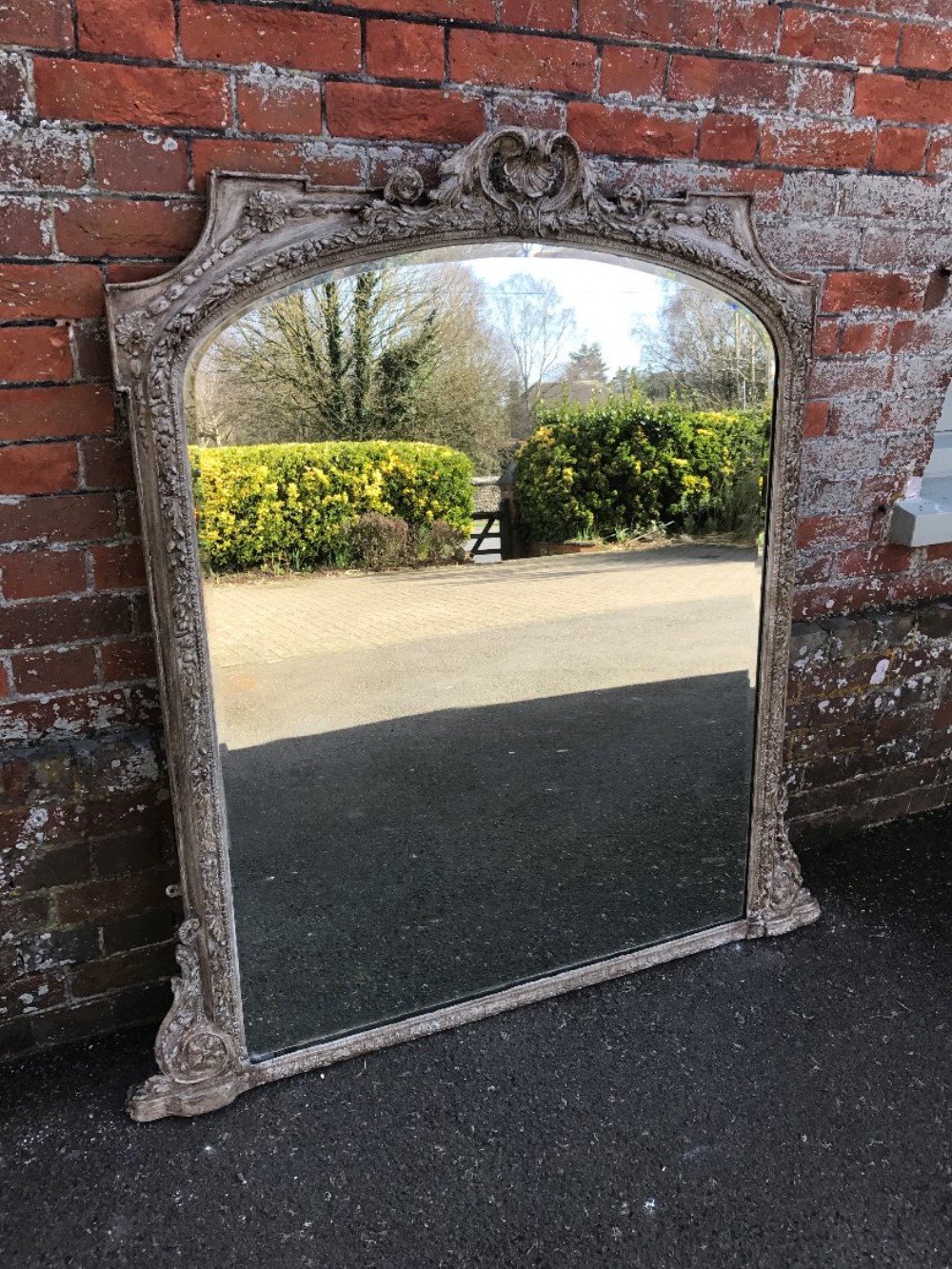 A Stunning large Antique 19th Century French carved wood and gesso painted shaped top Mirror.