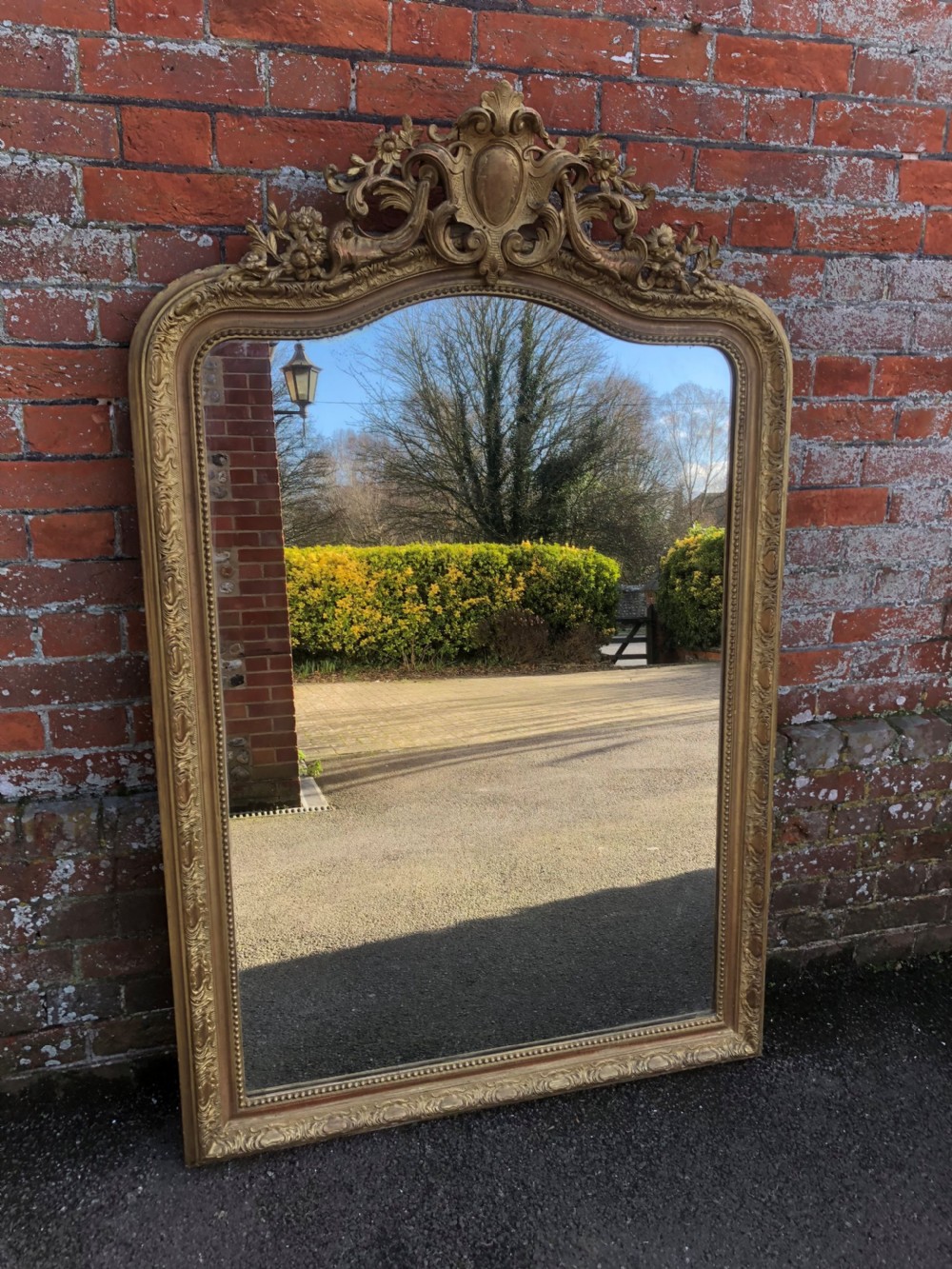 A Delightful large Antique 19th Century French carved wood and gesso shaped top original gilt Mirror. View VI