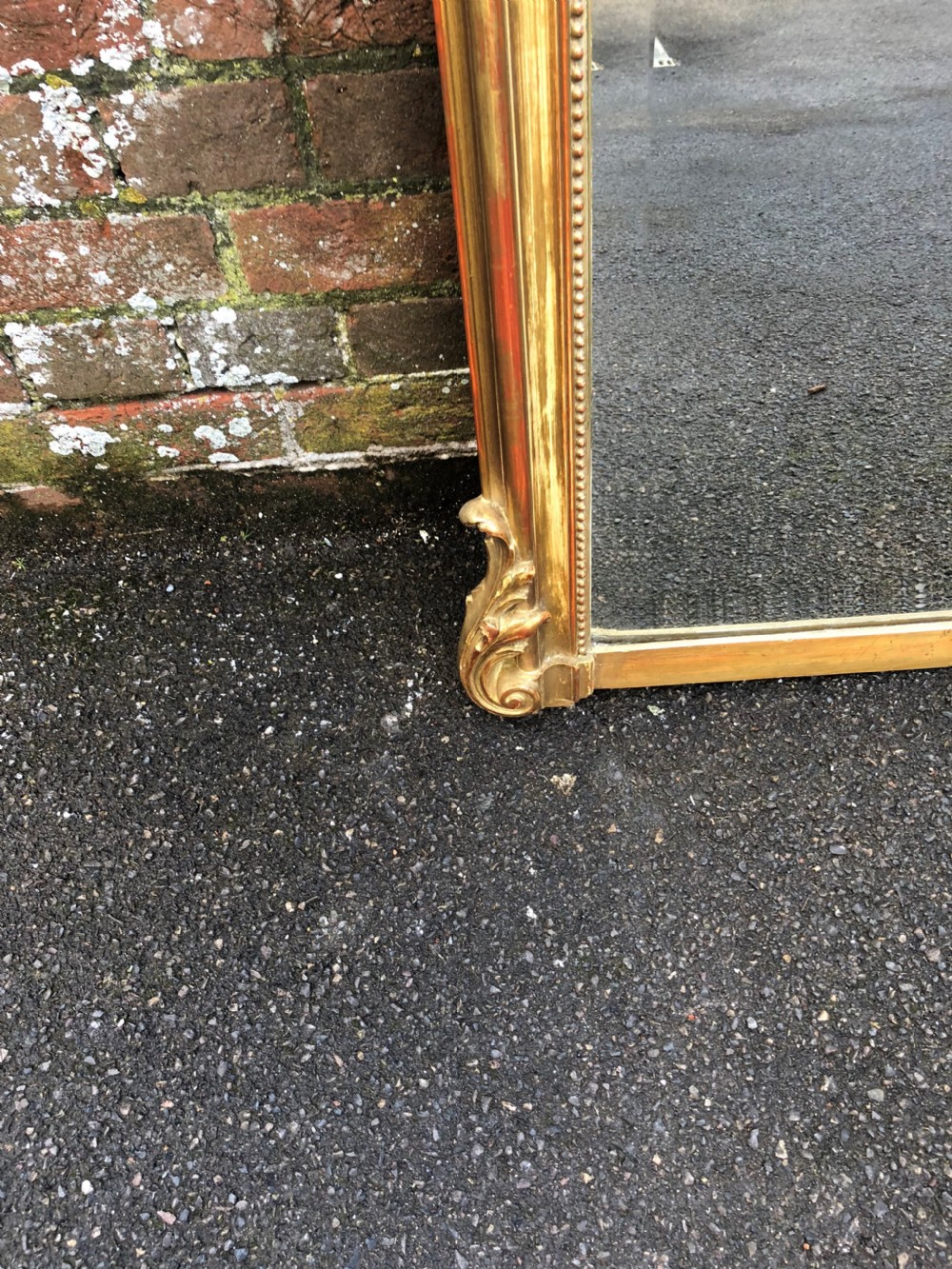 A Spectacular Large Antique 19th Century French carved wood and gesso original gilt shaped top Mirror. View IV