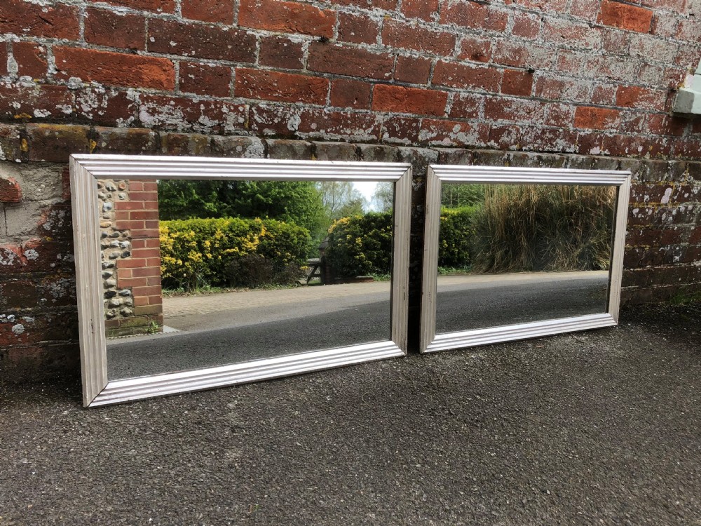 A Superb Pair of Antique 19th Century French carved wood and gesso original silvered ribbed Bistro Mirrors with original mercury mirror. View VI