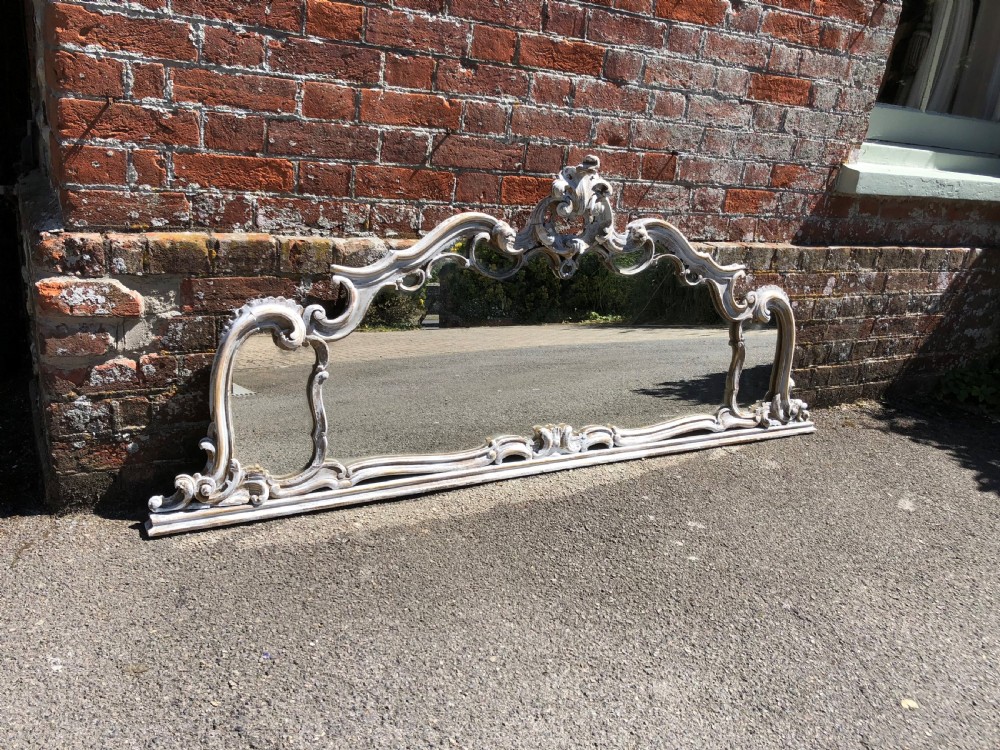 A Fabulous large Antique 19th Century Italian carved wood distressed painted shaped Mirror. View IV