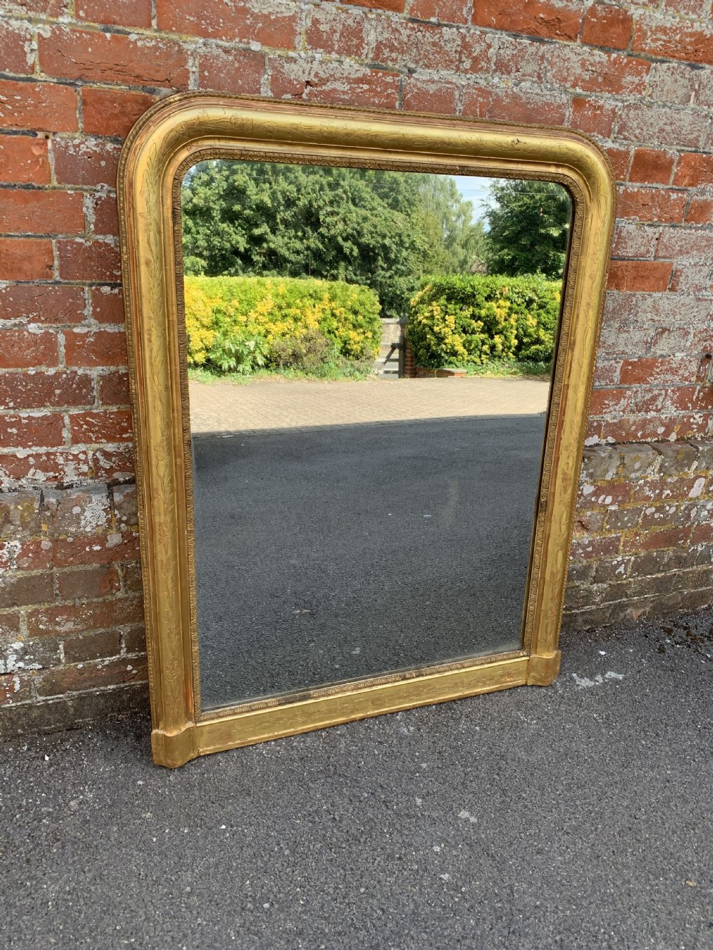 A Wonderful large Antique French 19th Century carved wood and gesso arched top original gilt etched framed Mirror.