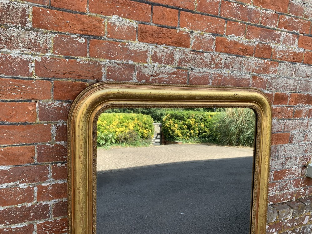A Wonderful large Antique French 19th Century carved wood and gesso arched top original gilt etched framed Mirror. View IV