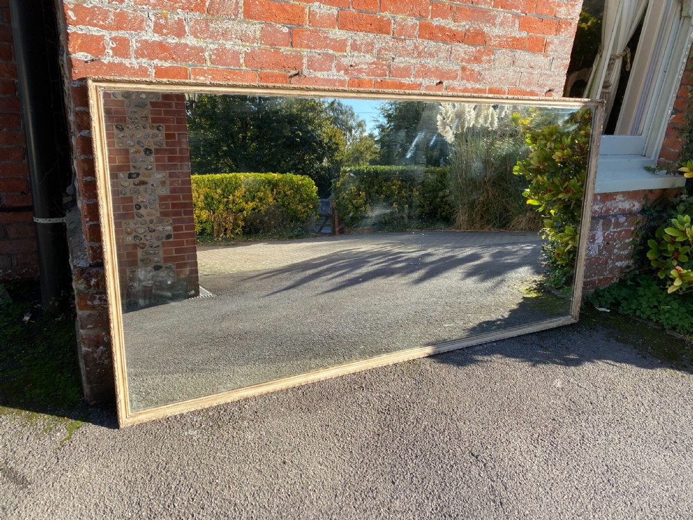 A HIghly impressive large Antique French 19th Century carved wood and gesso painted Bistro Mirror.