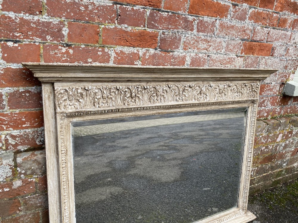 A Fabulous highly unusual pair of Antique English 19th Century carved wood and gesso painted Overmantle Mirrors. View II