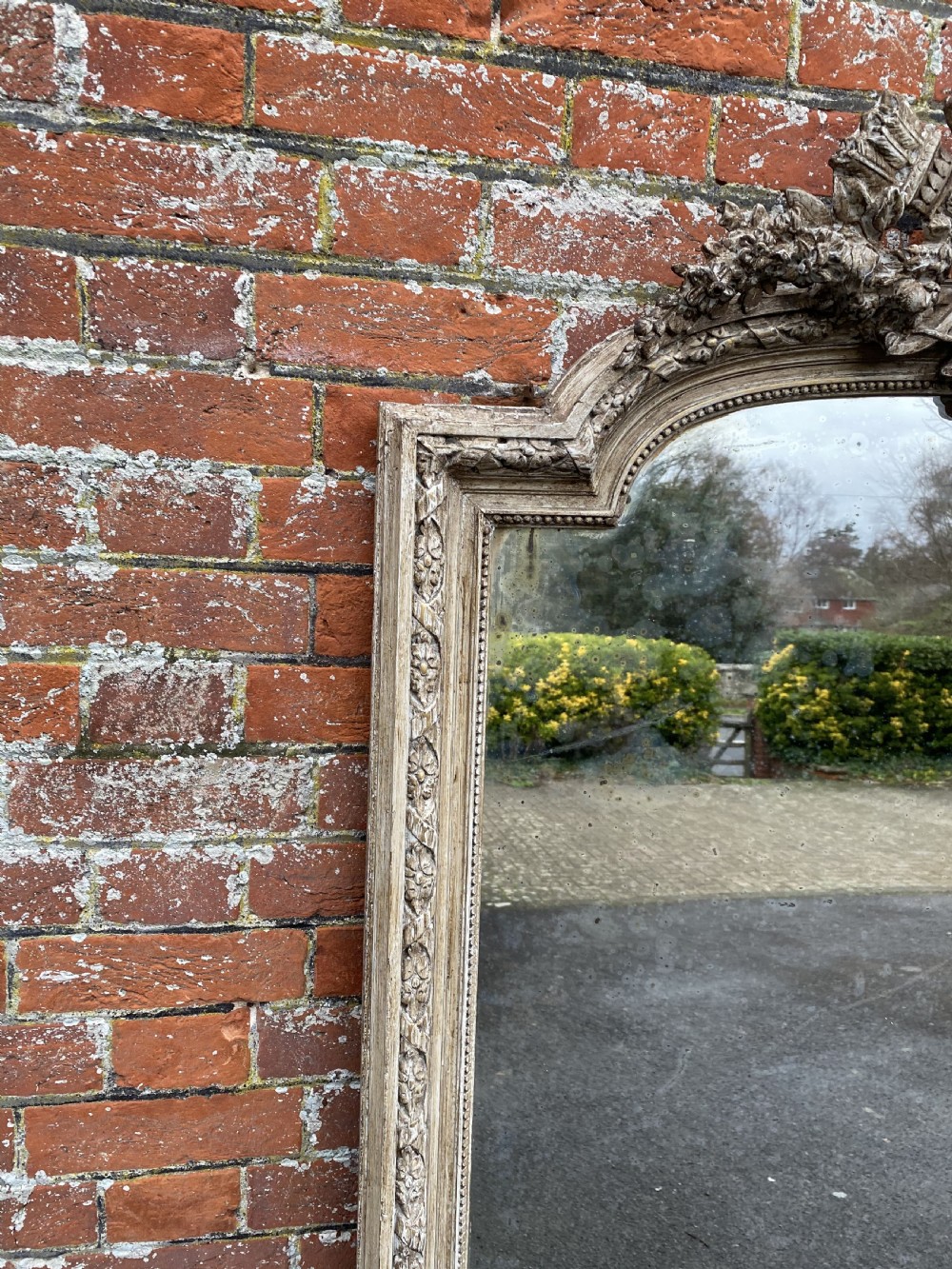 A Stunning large Antique French 19th Century carved wood and gesso shaped top painted Mirror. View II