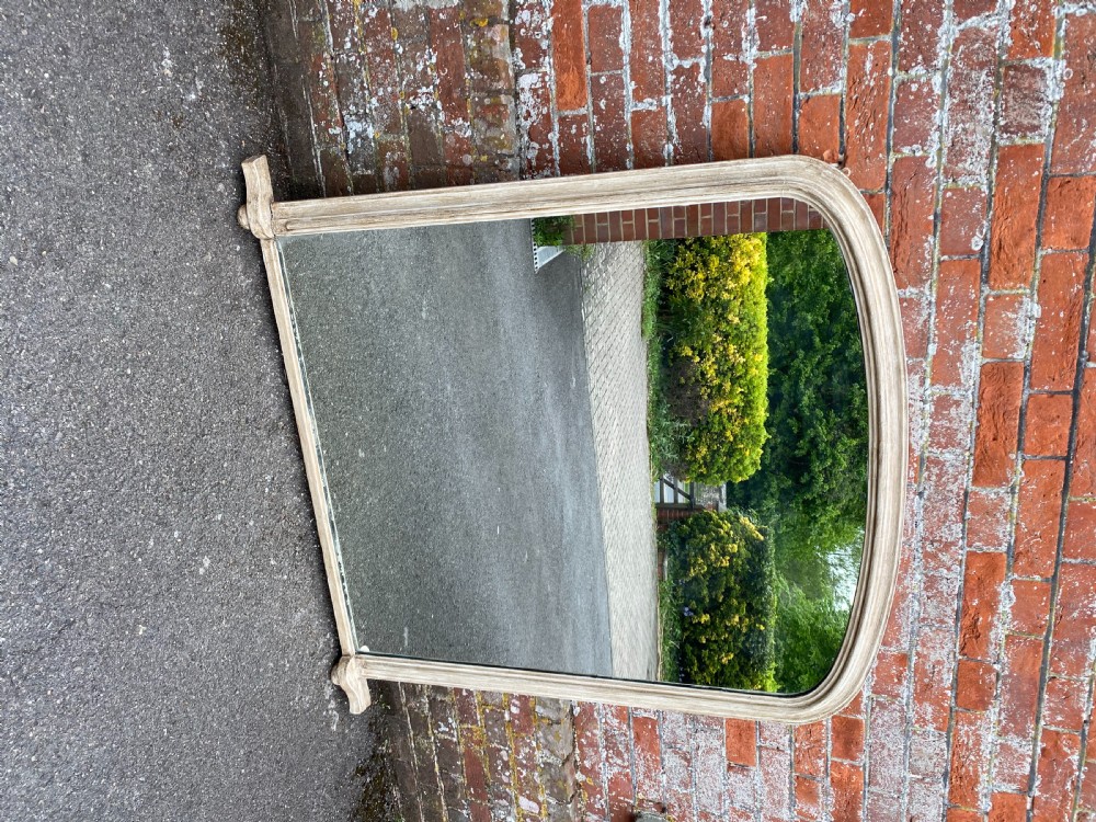 An Exceptional Near Pair of Antique English 19th Century carved wood & gesso arched top painted Overmantle Mirrors. View V