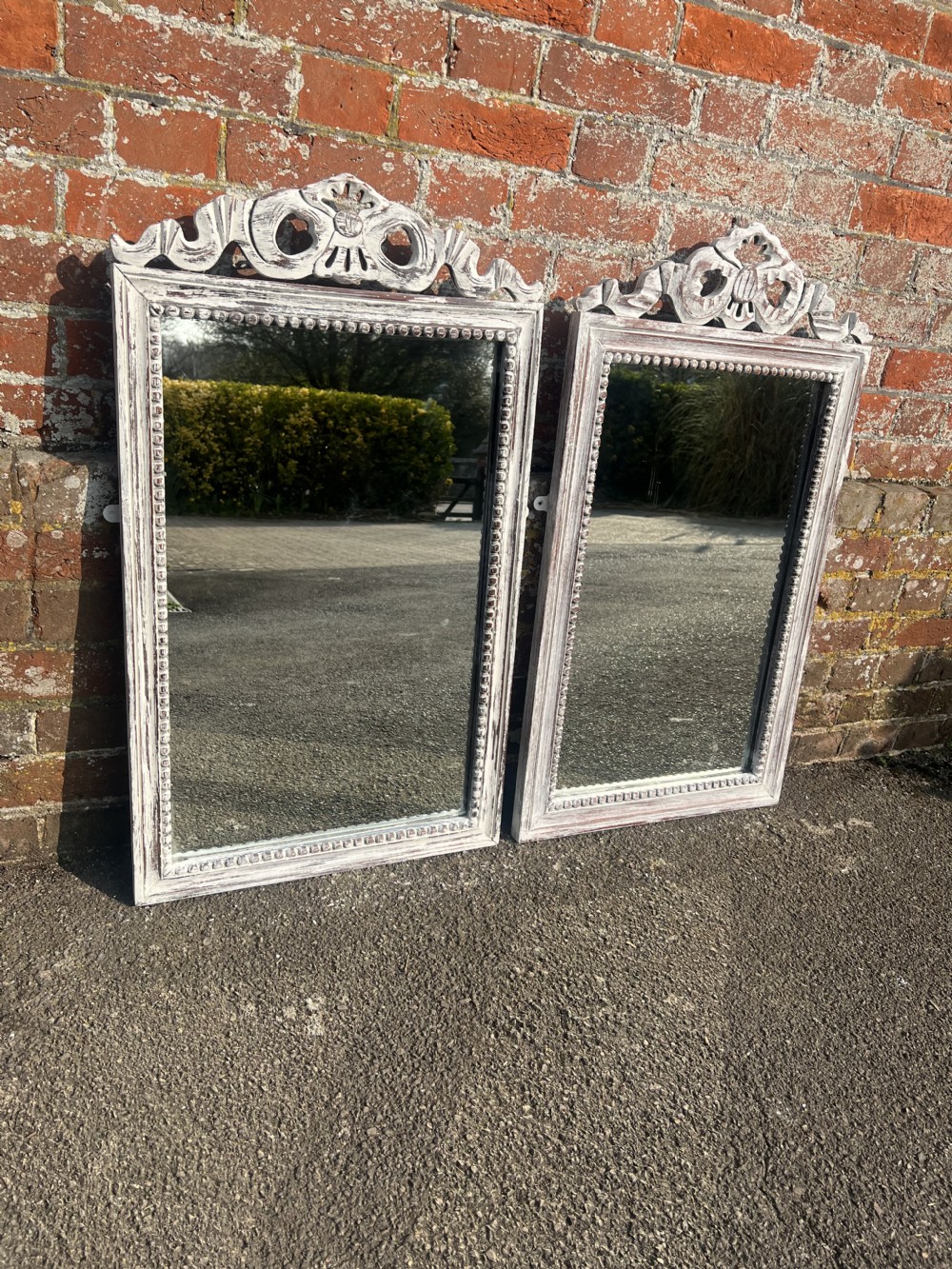 A Wonderful near Pair of French Early 20th Century carved wood distressed painted Mirrors. View VIII