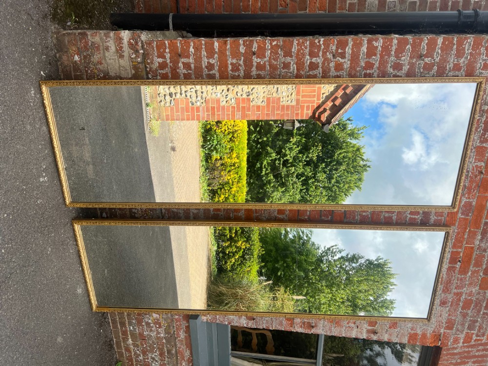 A Spectacular Pair of Large Antique English 19th Century carved wood & gesso gilt level leaf framed Pier Mirrors. View VII