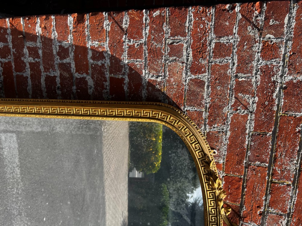 An Exceptional large Antique English 19th Century arched top gilt Overmantle Mirror. View II