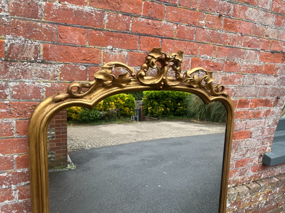 A Fabulous large Antique English 19th Century carved wood & gesso shaped top gilt Overmantle Mirror. View III
