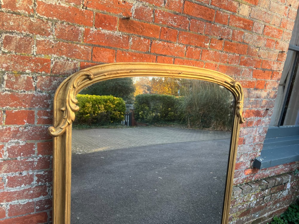 A Stunning large Antique English 19th Century carved wood & gesso arched top gilt Overmantle Mirror. View V