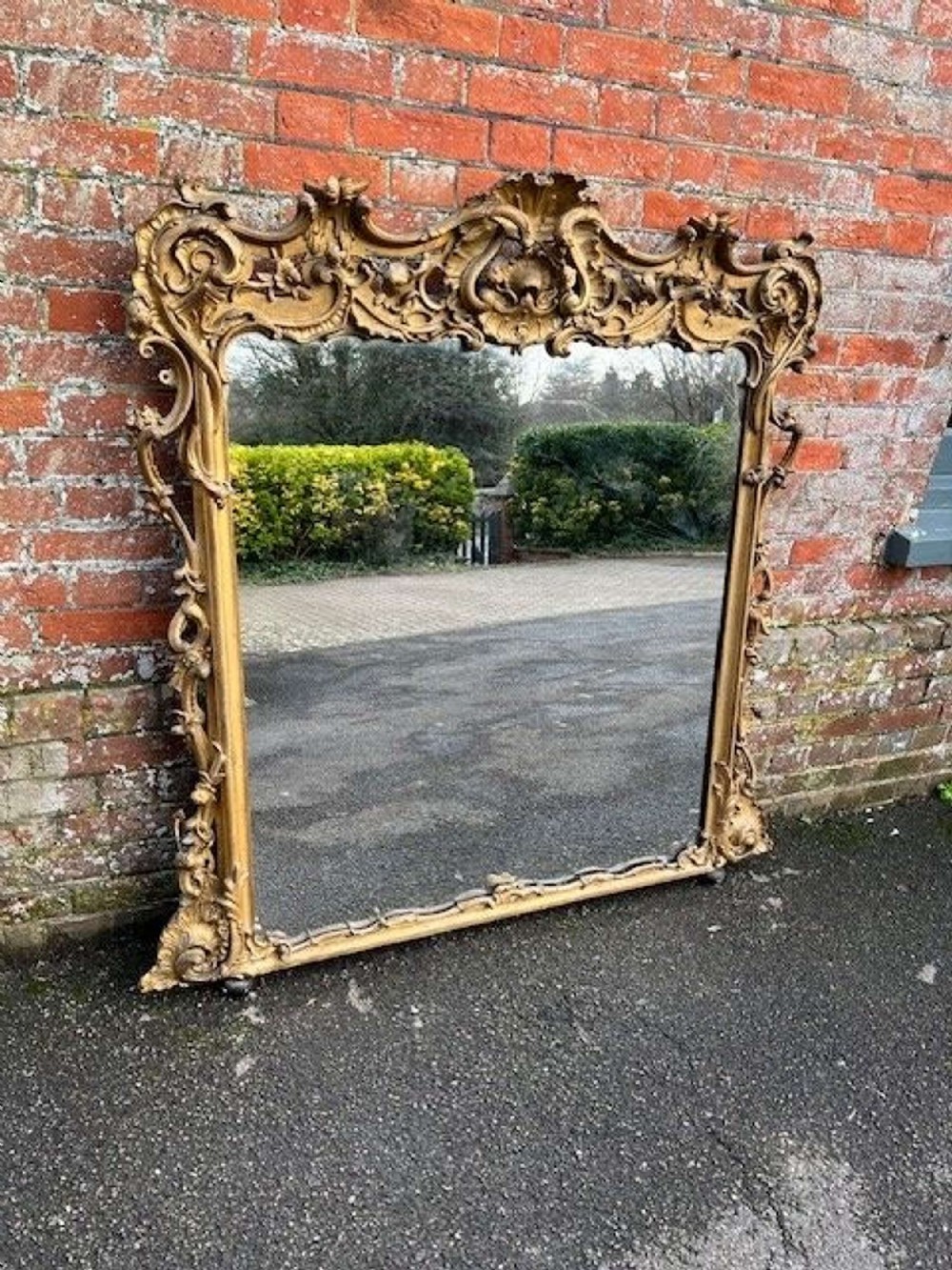A Spectacular large Antique English 19th Century  gilt Overmantle Mirror.