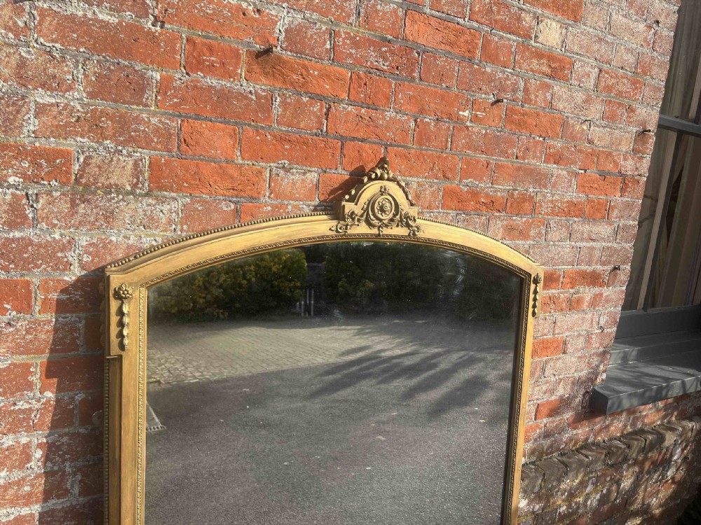 A Fabulous large Antique English 19th Century carved wood & gesso shaped top gilt Overmantle Mirror. View V