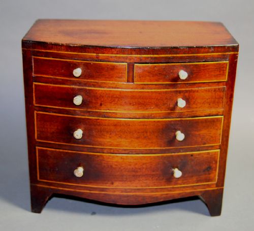 a miniature george iii bow fronted chest of drawers - CATEGORY: ANTIQUE CHEST OF DRAWERS - DATED GEORGIAN