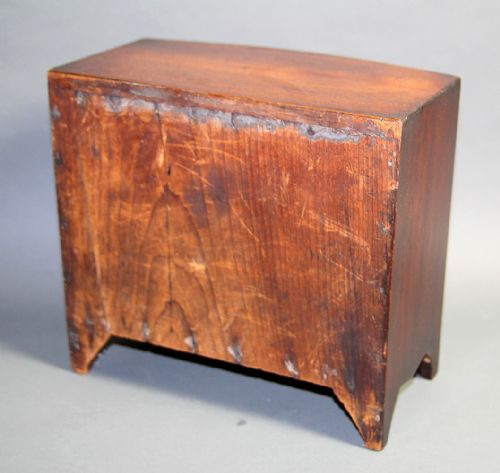 A MINIATURE GEORGE III BOW FRONTED CHEST OF DRAWERS - ADDITIONAL PHOTO 3