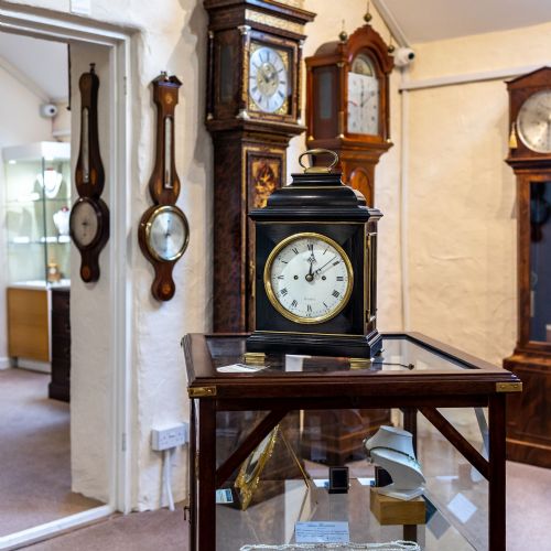 fig 3. JOHN ELLICOTT EBONISED STRIKING TABLE CLOCK WITH VITREOUS ENAMEL DIAL