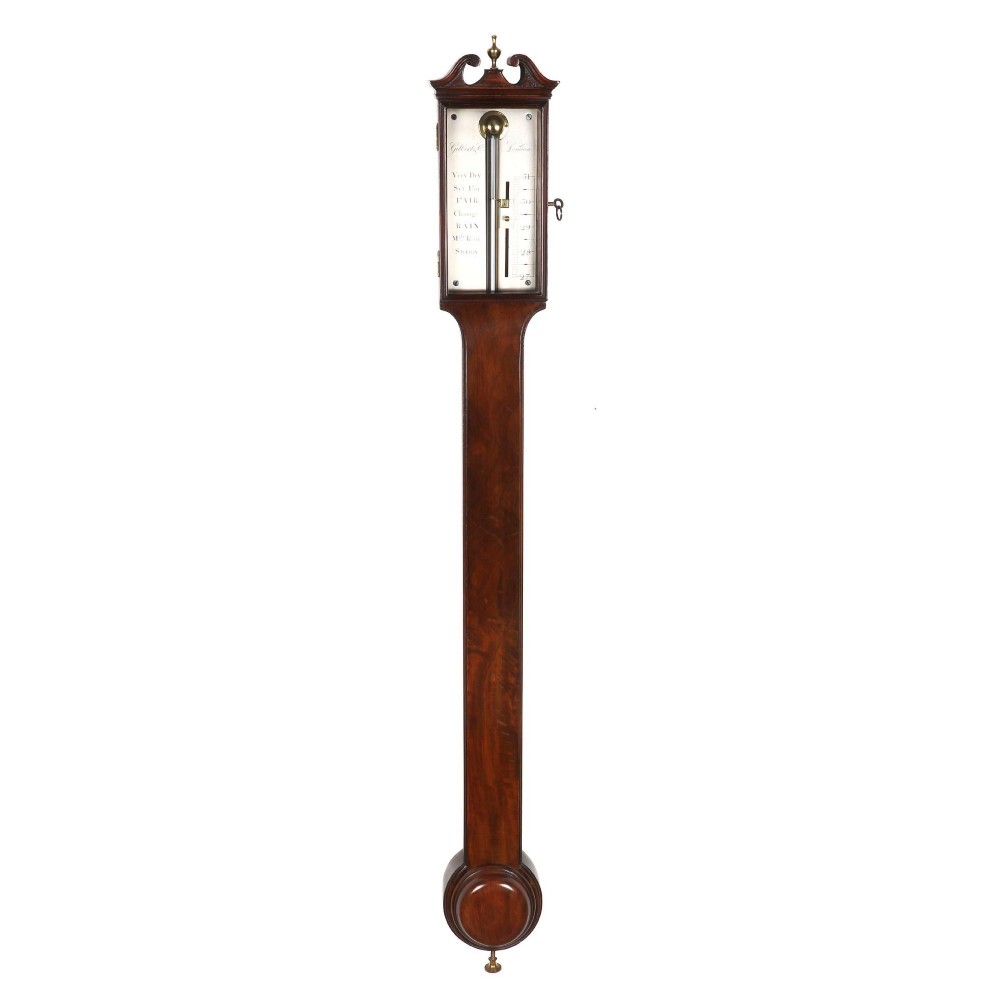 MAHOGANY STICK BAROMETER BY GILBERT AND CO.