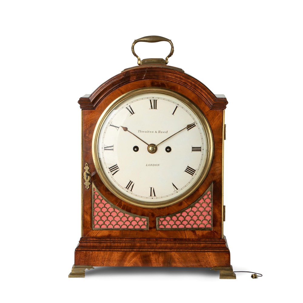 A FINE REGENCY BRASS MOUNTED MAHOGANY VERGE STRIKING BRACKET CLOCK
