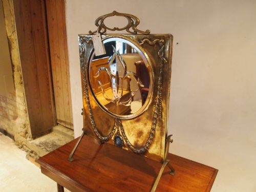 fig 4. Mirror fire screen Arts and Crafts brass and cabachon enamel c1900