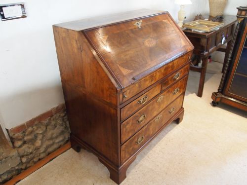fig 3. Bureau George II figured Walnut exceptional stepped interior c1740