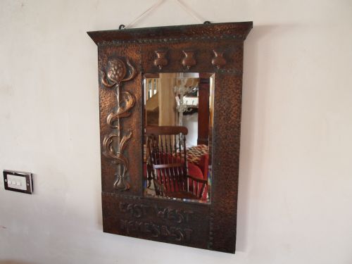 Mirror Arts and Crafts Copper 'East West Hames Best' Possibly Libertys C1900