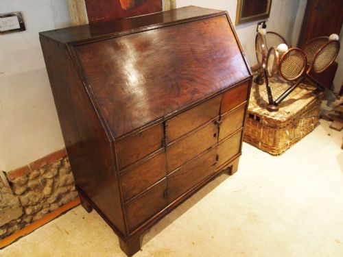 fig 1. Cupboard A rare solid Elm 18th century in the form of a bureau cupboard c1700