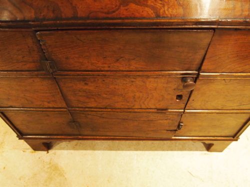 fig 3. Cupboard A rare solid Elm 18th century in the form of a bureau cupboard c1700