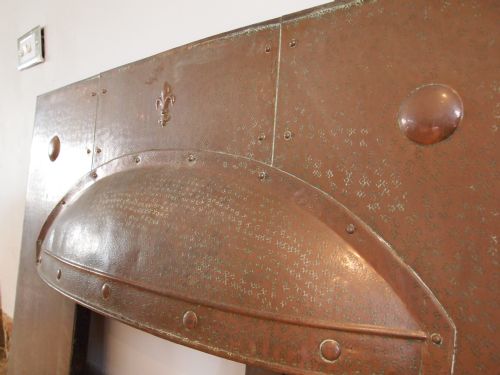 fig 1. Fire place surround Arts and Crafts copper c1900