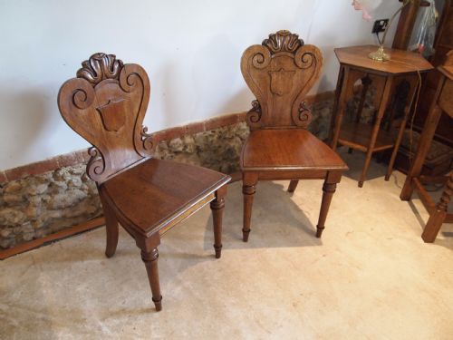 fig 3. Chairs pair of William IV carved Oak hall chairs c1835