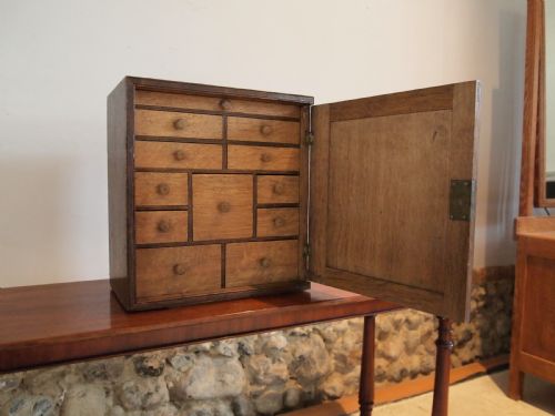 fig 1. Cabinet spice cupboard George III Oak c1790