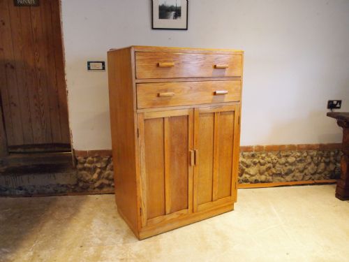 Tallboy Cupboard Chest of Drawers in the Manner of Heals Oak C1930