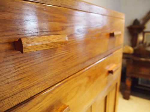 fig 1. Tallboy cupboard chest of drawers in the manner of Heals Oak c1930