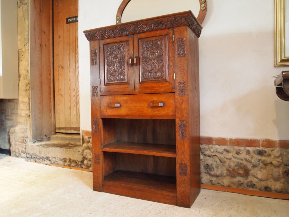 Bookcase Victorian Arts and Crafts carved Oak c1890