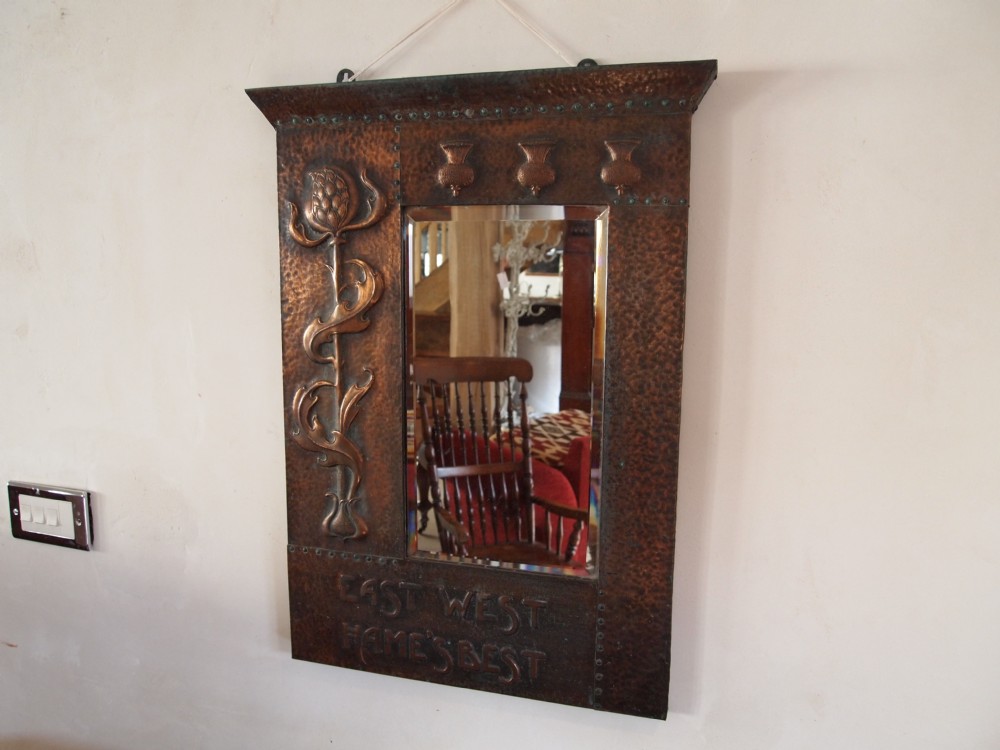 Mirror Arts and Crafts copper 'East West Hames Best' Possibly Libertys c1900