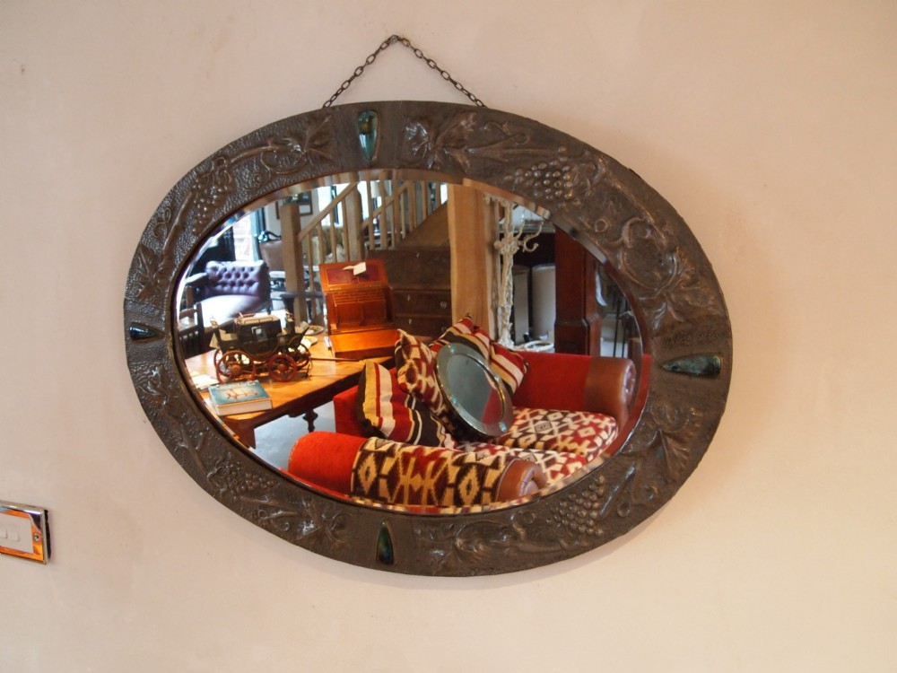 Mirror Arts and crafts pewter frame with Ruskin enamels c1900