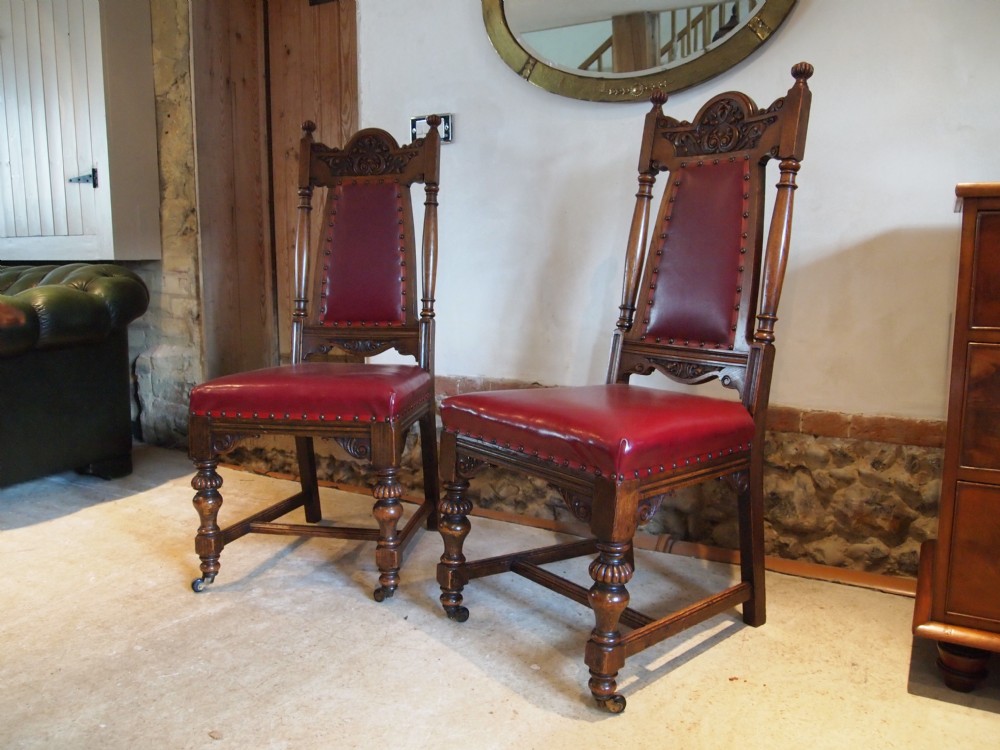 Chair chairs a pair of Oak and leather Arts and Crafts Hall chairs c1900