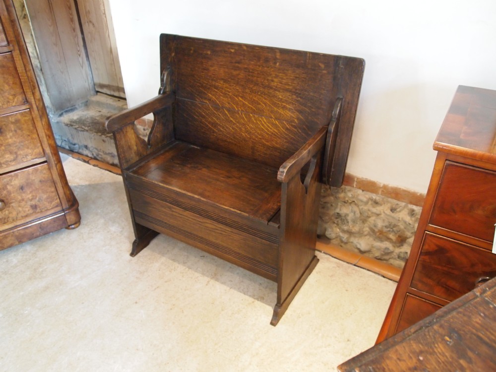 Settle seat Monks bench Arts and crafts Oak Liberty and co c1900