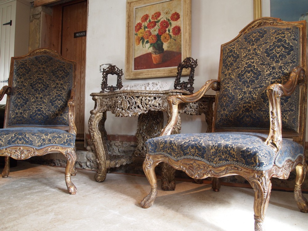 Chairs a pair of carved Giltwood French Fauteuils c1920