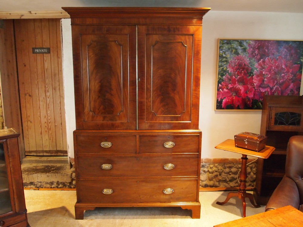 Wardrobe chest of drawers Linen press George III Flame Mahogany c1790