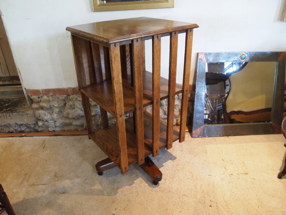 Bookcase Edwardian Oak revolving bookcase with reading stand c1910